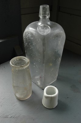 Bottles found at Suquamish (half pint and cream pitcher) and Norrander's (gin).
