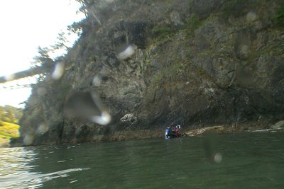 Little North Beach at east end has a rock which I call &quot;Jan's Rock&quot; where Jan usually enters the water and places his camera while putting his fins on. Jan in the picture.