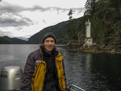 My dive buddy for the weekend, Chris with Mozino Point and Esperanza Inlet behind him.