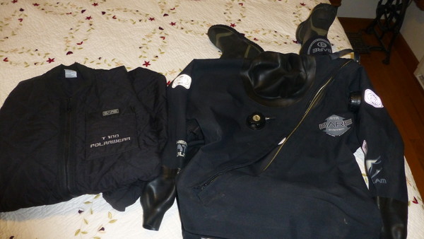 Bare Trilam drysuit MS with built in boots, one pocket and leg gaiters. Used less than a dozen times. Paid 1800 new. Asking $700. Comes with woolies and carrying bag