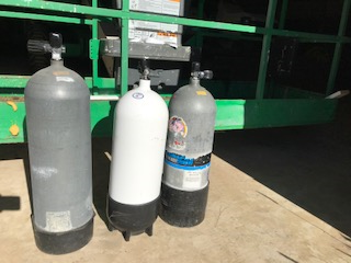 2 steel tanks, 1 is 130 high pressure and a low pressure 95. both out of hydro. Middle white one is sold. Asking $100. for the 130 and $75. for the 95  SOLD