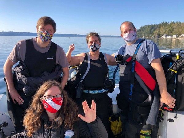 4 happy divers