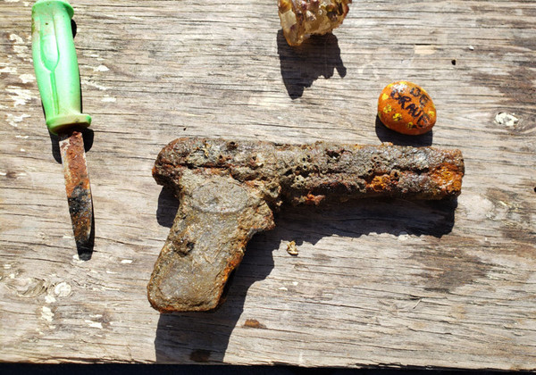 At first we thought this was a recent gun and we were going to take it to the police. A little clean-up and investigation shows it had been in the water for maybe 100 years.